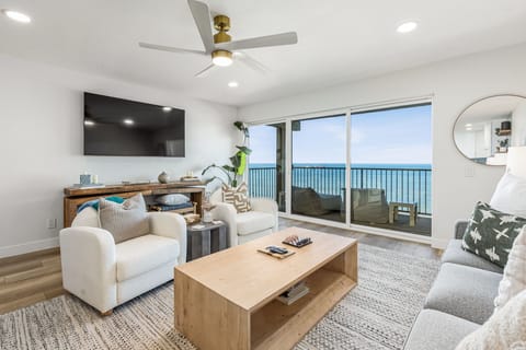 Living Room - Ocean views take center stage in this bright living room.