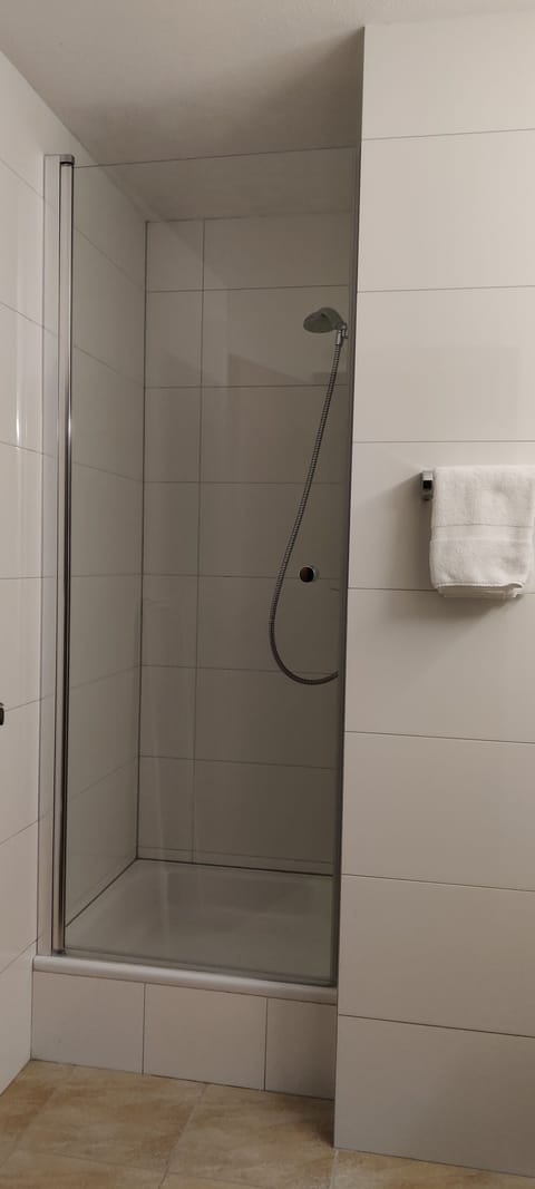 Quadruple Room | Bathroom | Shower, hair dryer, towels, soap