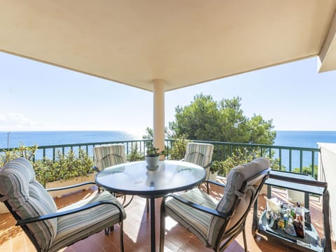 Building, Property, Table, Sky, Furniture, Azure, Water, Plant, Shade, Outdoor Furniture