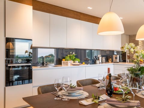 Interior Design, Furniture, Kitchen, Countertop, Light Fixture, Ceiling, Flooring, Lighting, Home, Kitchen & Dining Room Table