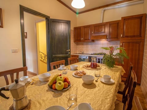 Tableware, Property, Table, Cabinetry, Furniture, Food, Interior Design, Dishware, Lighting, Wood