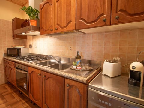 Brown, Cabinetry, Countertop, Property, Sink, Kitchen Sink, Kitchen Stove, Kitchen, Kitchen Appliance, Wood