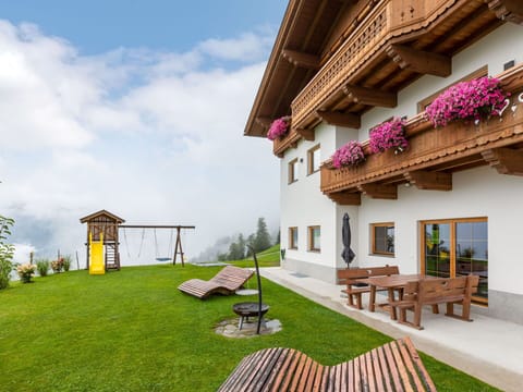 Cloud, Sky, Plant, Property, Natural Landscape, Tree, Land Lot, Outdoor Furniture, Shade, Grass