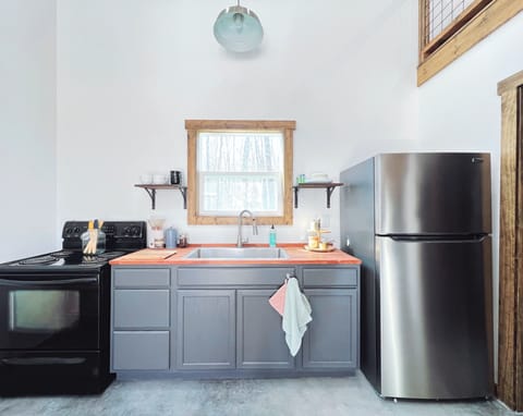 Full kitchen located in tiny home