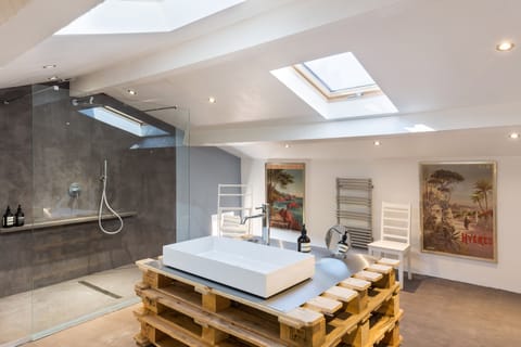 Australian Room | Bathroom | Designer toiletries, hair dryer, towels, soap