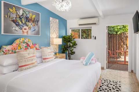 Experience a plush oasis of comfort in our stylish Palm Springs bedroom. Your relaxing desert retreat awaits — book your boutique getaway today.