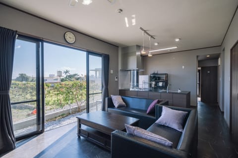 Exclusive Villa, 3 Bedrooms, Kitchen, Garden View | Living area | 50-inch LCD TV with digital channels, Netflix, streaming services