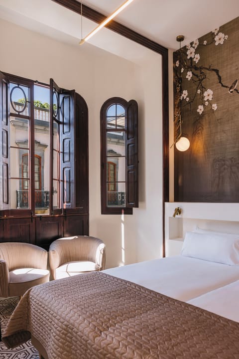 Classic Exterior | Hypo-allergenic bedding, in-room safe, desk, laptop workspace