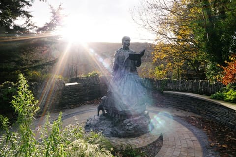 Statue in walled garden area