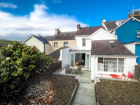 Patio area leading to gravelled garden