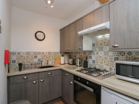 Fridge, electric kettle, toaster, cookware/dishes/utensils