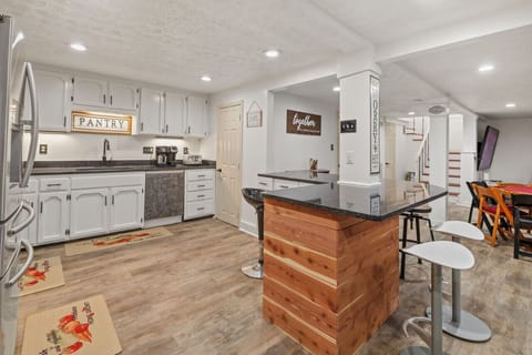 Fully stock kitchen with coffeemaker, toaster, panini press, instant cooker and all cooking essentials