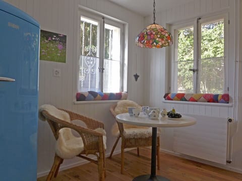 Furniture, Property, Window, Table, Green, Wood, Interior Design, Shade, Lighting, Chair