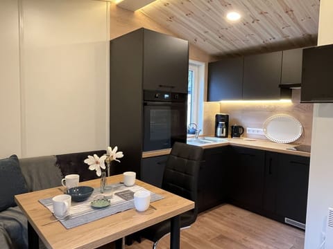 Furniture, Flower, Table, Cabinetry, Property, Couch, Countertop, Building, Interior Design, Comfort
