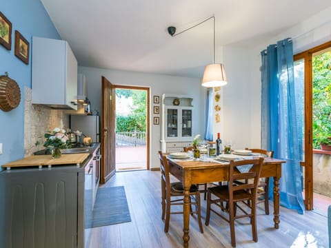 Table, Property, Furniture, Plant, Window, Azure, Wood, Cabinetry, Chair, Lighting