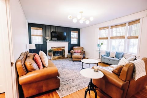 Relax on this cozy couch. It’s the perfect room for family game nights or movie marathons! 