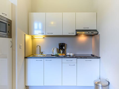 Cabinetry, Property, Kitchen Sink, Kitchen Appliance, Countertop, Sink, Kitchen, Home Appliance, Kitchen Stove, Tap