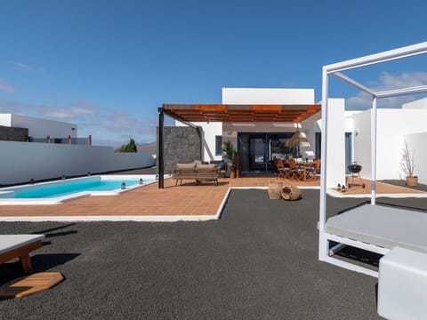 Property, Sky, Building, Architecture, Water, Shade, House, Outdoor Furniture, Floor, Leisure