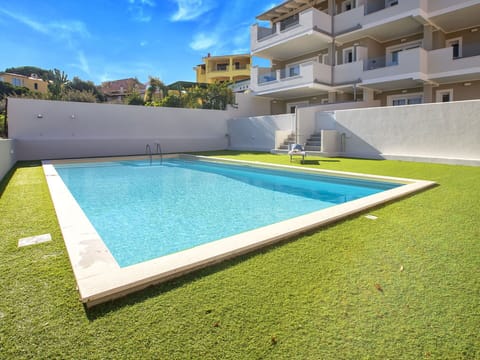 Water, Plant, Property, Building, Sky, Swimming Pool, Azure, Rectangle, Window, Shade