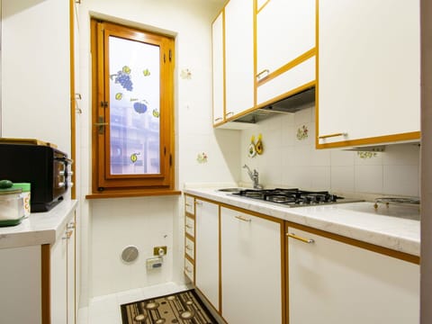 Property, Cabinetry, Interior Design, Kitchen, Sink, Wood, Yellow, Kitchen Stove, Kitchen Appliance, Floor