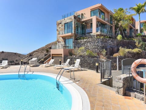 Water, Sky, Property, Azure, Swimming Pool, Building, Leisure, Real Estate, Plant, Composite Material
