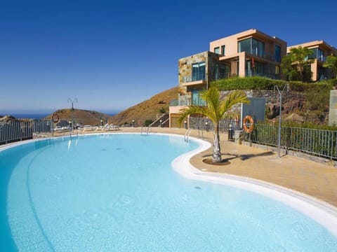 Water, Sky, Building, Seaside Resort, Swimming Pool, Plant, Outdoor Furniture, Tree, Shade, Leisure
