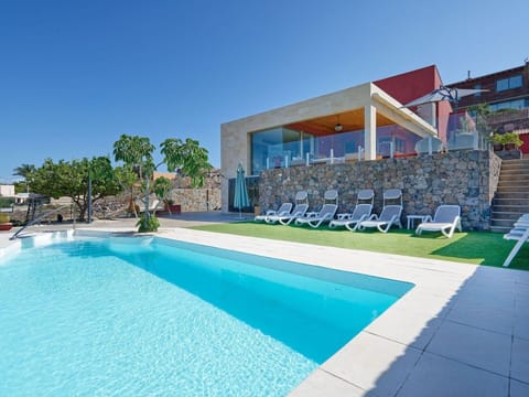 Building, Azure, Swimming Pool, Sky, Shade, Tree, Water, Rectangle, Urban Design, Outdoor Furniture
