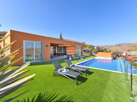 Sky, Building, Swimming Pool, Rectangle, Outdoor Furniture, Shade, Land Lot, House, Urban Design, Plant