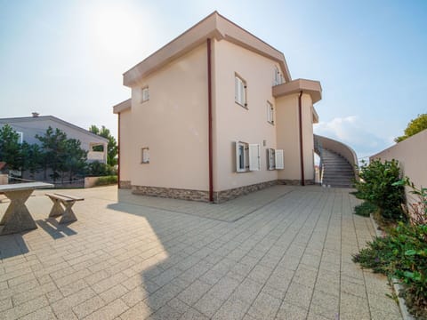 Sky, Plant, Building, Property, Window, House, Road Surface, Door, Urban Design, Residential Area