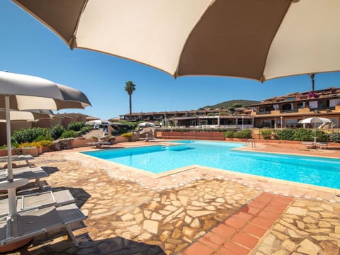 Water, Plant, Sky, Property, Building, Swimming Pool, Umbrella, Azure, Outdoor Furniture, Shade