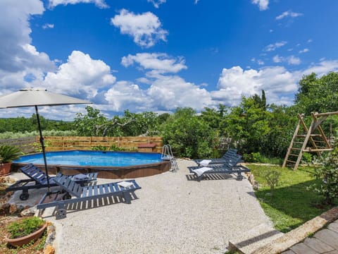 Cloud, Sky, Water, Plant, Swimming Pool, Shade, Outdoor Furniture, Arecales, Natural Landscape, Leisure