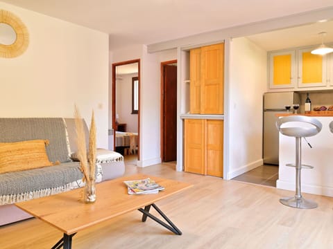 Furniture, Property, Interior Design, Comfort, Wood, Table, Cabinetry, Orange, Flooring, Yellow