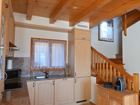 Cabinetry, Property, Countertop, Sink, Window, Kitchen Sink, Wood, Building, Lighting, Interior Design