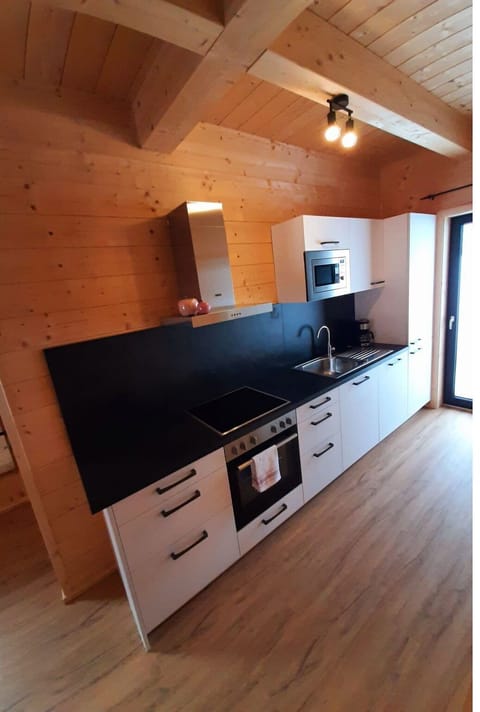 Cabinetry, Property, Countertop, Building, Wood, Kitchen, Flooring, Drawer, Architecture, Interior Design