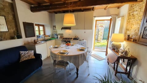 Furniture, Table, Property, Plant, Chair, Couch, Wood, Window, Houseplant, Floor