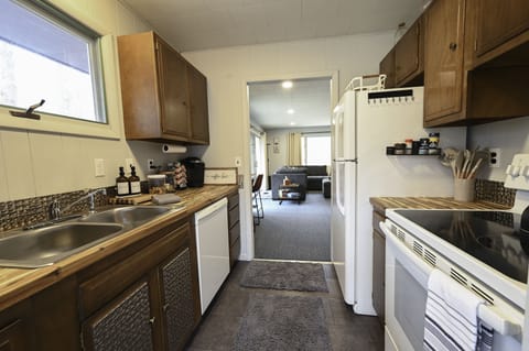 Kitchen. You can see entry into living area