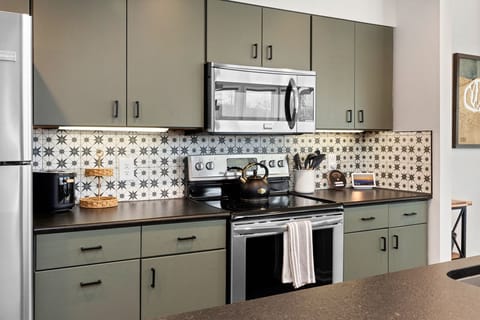 Fully stocked kitchen with everything you need to make a home cooked meal.