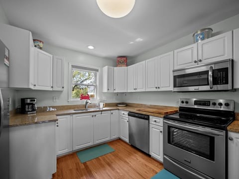 Fully equipped kitchen with everything needed to cook your meals in