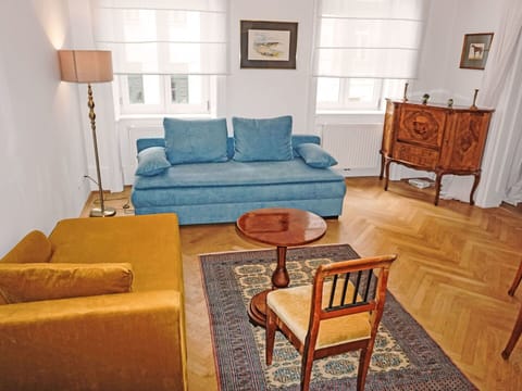 Furniture, Couch, Flooring, Interior Design, Floor, Wood, Living Room, Room, Apartment, Wood Flooring