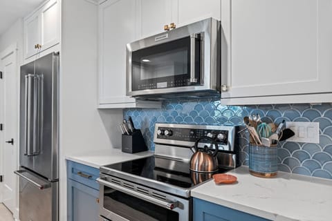 Stainless appliances and modern finishes