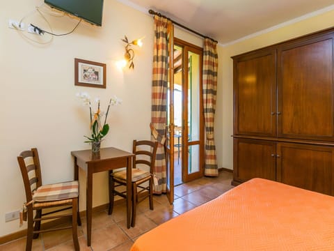 Furniture, Property, Picture Frame, Wood, Orange, Comfort, Lighting, Plant, Chair, Interior Design