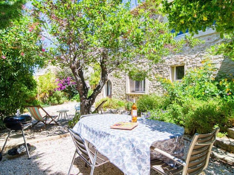 Plant, Table, Furniture, Property, Window, Chair, Building, Flower, Tree, Outdoor Table