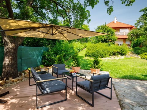 Plant, Property, Furniture, Building, Sky, Table, Tree, Shade, Outdoor Furniture, Outdoor Table
