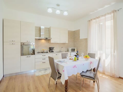 Furniture, Property, Cabinetry, Table, Countertop, Chair, Building, Wood, Lighting, Interior Design