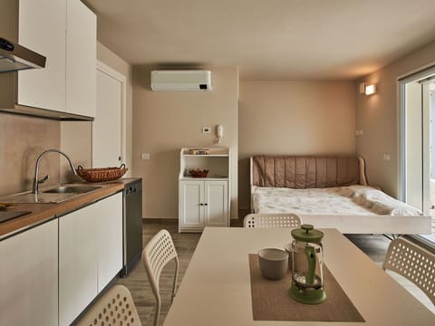 Sky, Building, Table, Window, Outdoor Furniture, Urban Design, Wood, Shade, Condominium, House