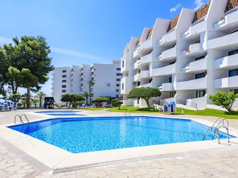 Water, Sky, Building, Daytime, Property, Plant, Swimming Pool, Azure, Body Of Water, Tree