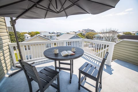 4th floor balcony is the perfect spot for quiet time with a book.  