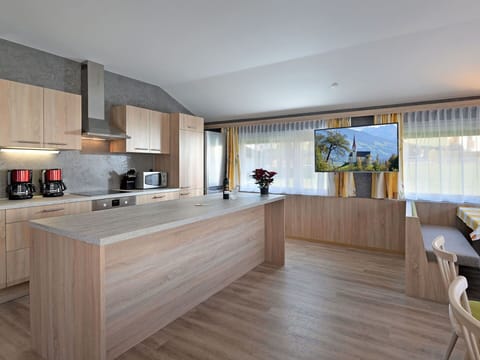 Property, Cabinetry, Furniture, Countertop, Wood, Lighting, Interior Design, Kitchen, Kitchen Appliance, Flooring