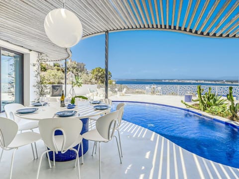 Water, Sky, Building, Property, Tableware, Window, Seaside Resort, Azure, Table, Architecture