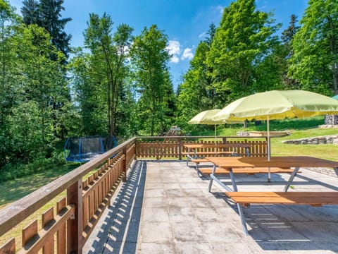 Sky, Plant, Property, Cloud, Tree, Shade, Natural Landscape, Wood, Outdoor Furniture, Outdoor Bench